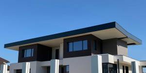 Примеры проектов частных домов, отделанных фасадными панелями Nichiha